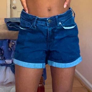 blue mid rise jean shorts